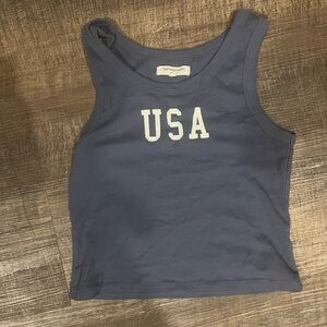 Grayson Threads blue crop top with white USA writing